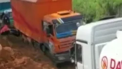 BeiBen Heavy-Duty Truck Driving on Muddy Road